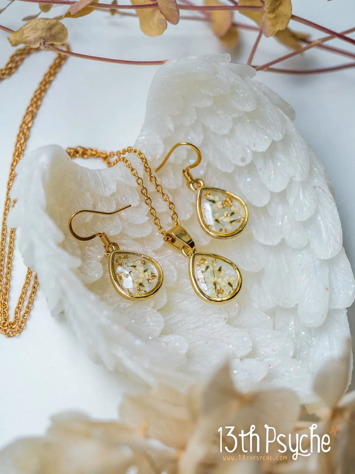 Dried white flowers and gold flakes resin teardrop earrings